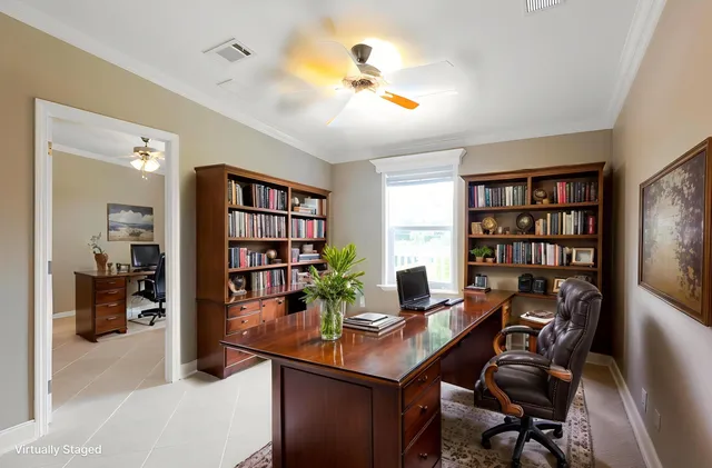 a view of a workspace with furniture and workspace