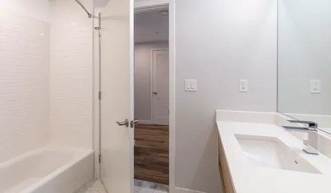 a bathroom with a sink and a bathtub