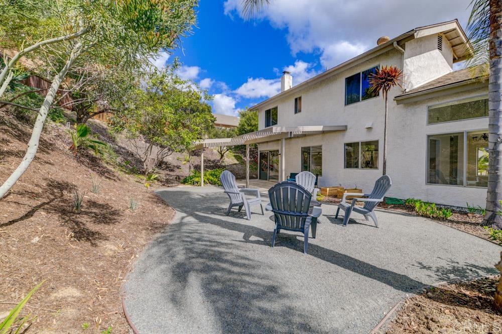 3573 Evening Canyon Road Oceanside, CA 92056 - Photo 17 of 45 a view of a house with backyard and sitting area