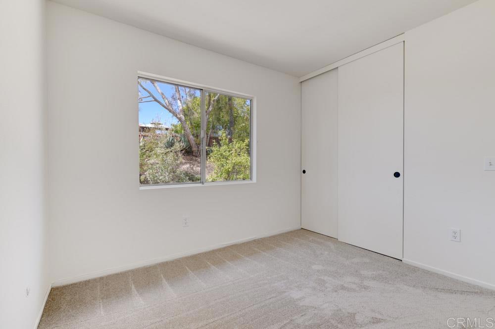 3573 Evening Canyon Road Oceanside, CA 92056 - Photo 26 of 45 a view of an empty room with a window