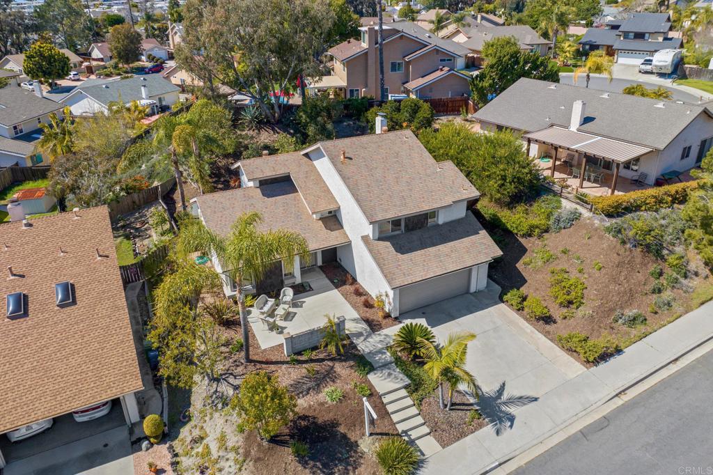 3573 Evening Canyon Road Oceanside, CA 92056 - Photo 32 of 45 an aerial view of a house with a yard swimming pool and outdoor seating