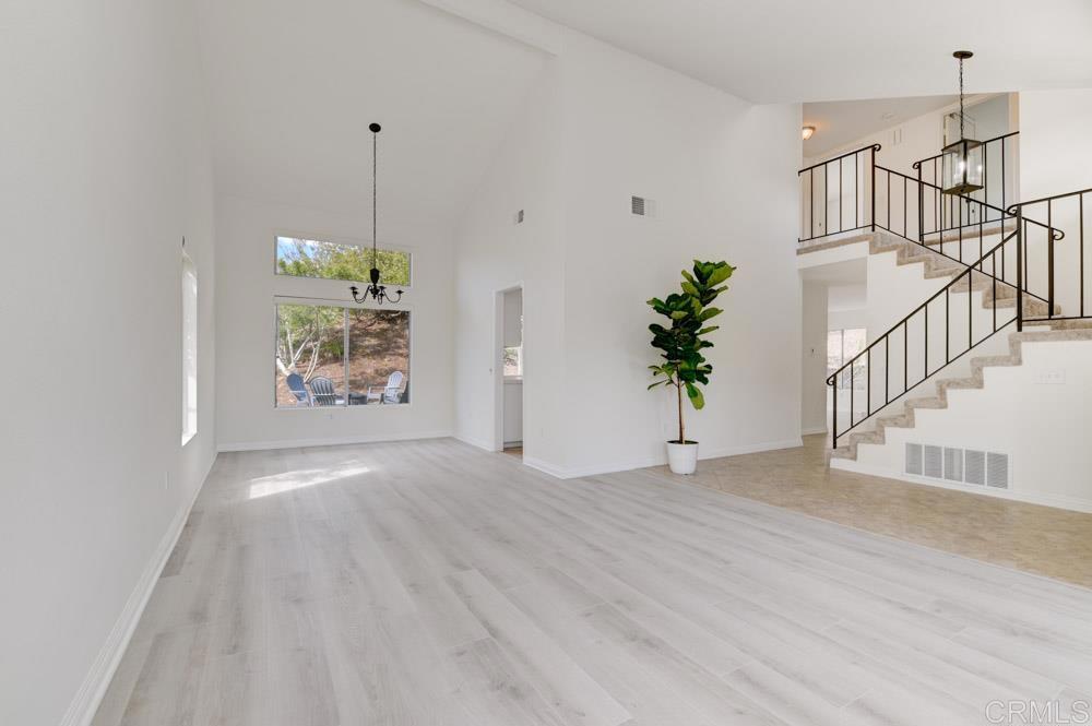 3573 Evening Canyon Road Oceanside, CA 92056 - Photo 4 of 45 a view of an entryway with wooden floor