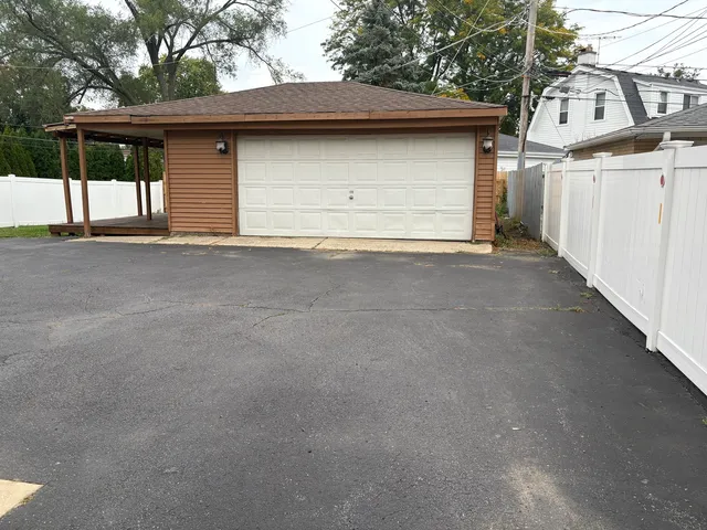 a front view of a house with a garage