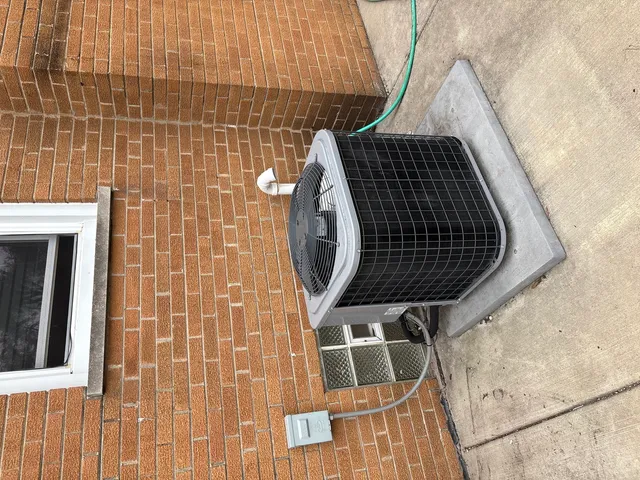 a view of a door with wooden floor and a window