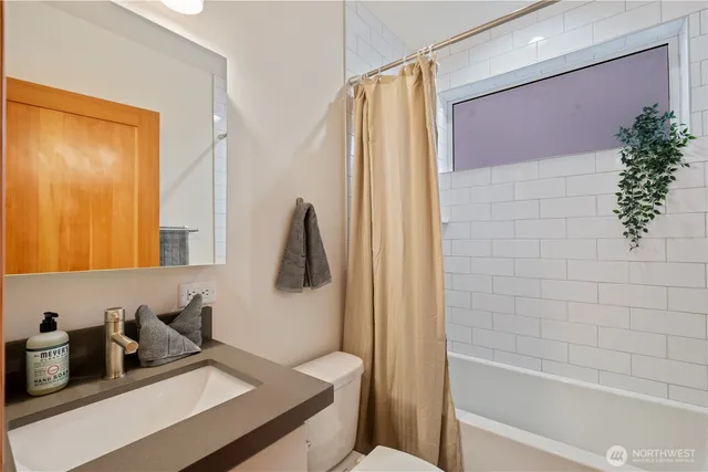 a work room with furniture and a window