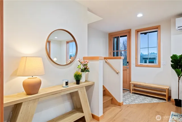 a view of a living room and entryway