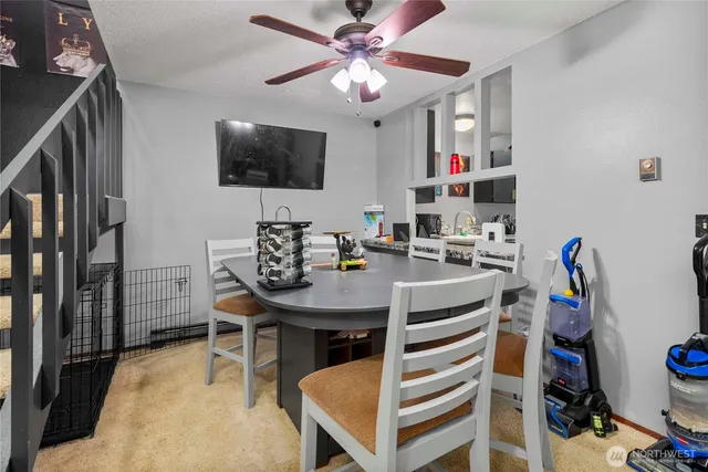 a view of a dining room with furniture