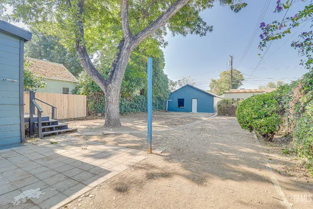 a view of backyard of a house