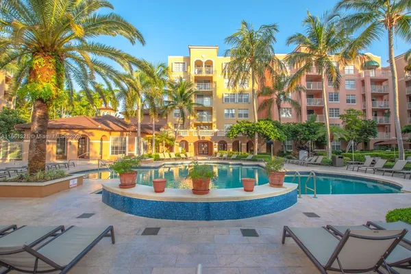 a view of a swimming pool with a patio