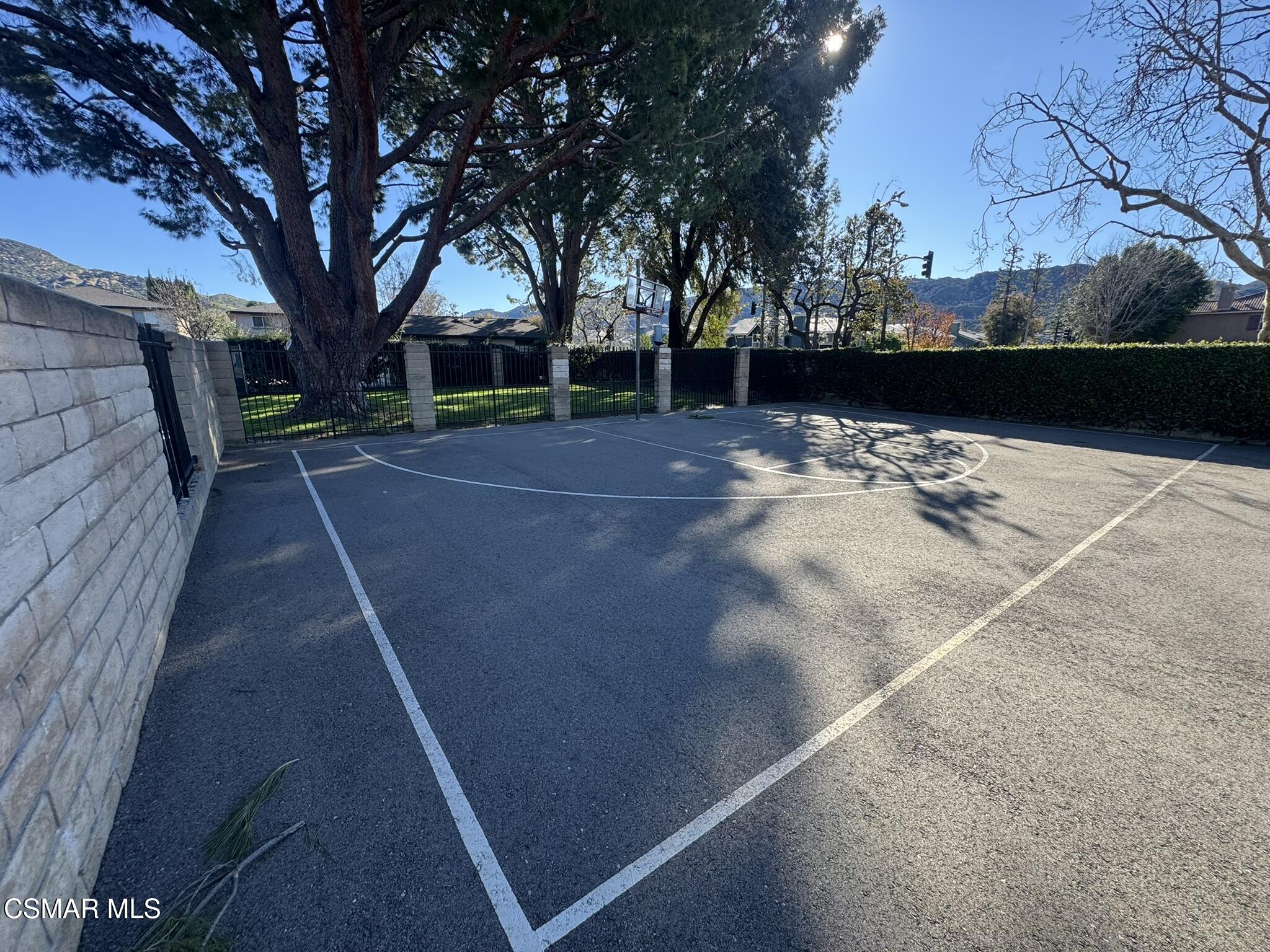 2030 Avenida Placida, Unit 4 Simi Valley, CA 93063 - Photo 16 of 18 a view of backyard with large trees