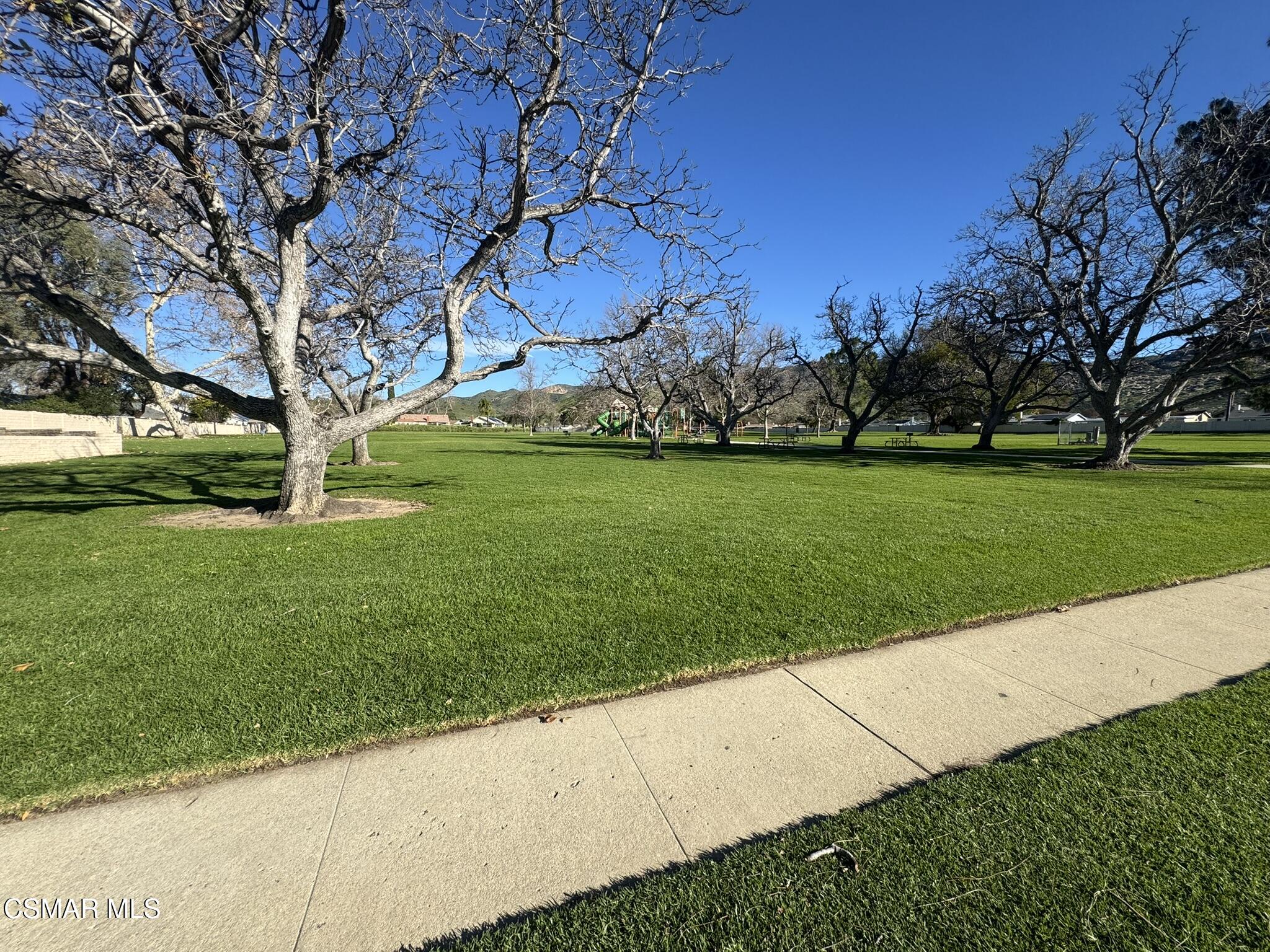 2030 Avenida Placida, Unit 4 Simi Valley, CA 93063 - Photo 17 of 18 a view of a park with large trees