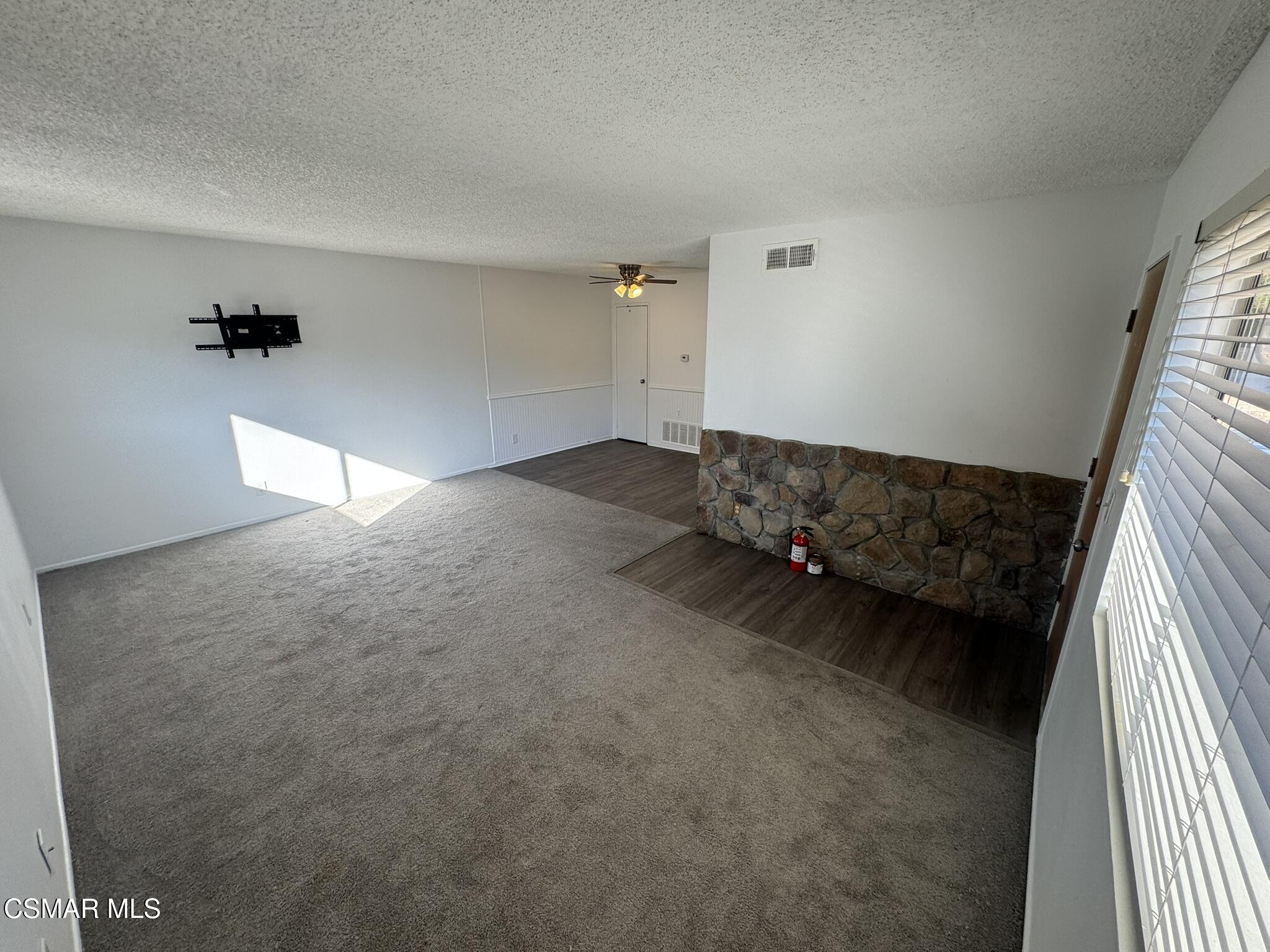 2030 Avenida Placida, Unit 4 Simi Valley, CA 93063 - Photo 2 of 18 a living room with a couch