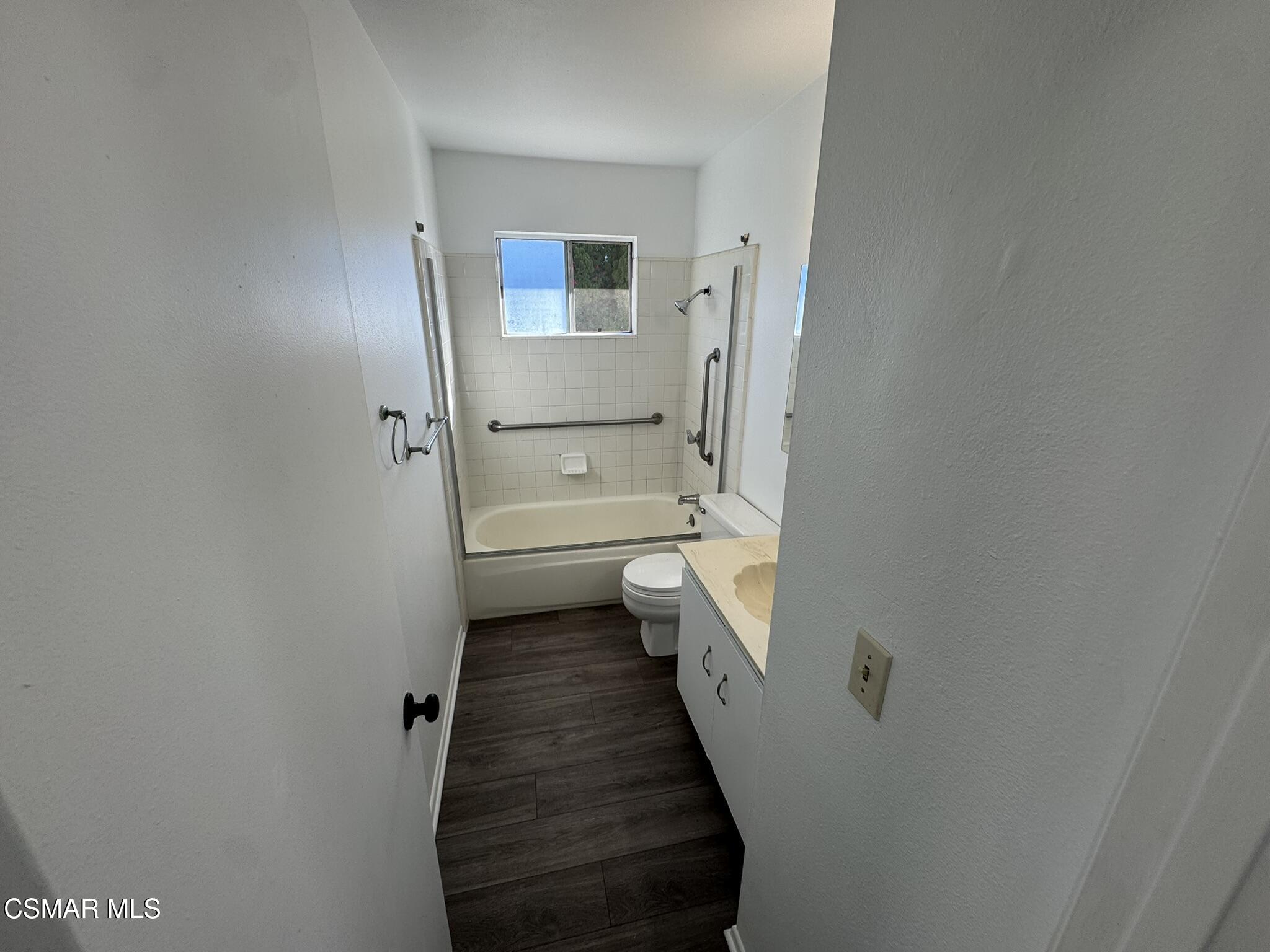 2030 Avenida Placida, Unit 4 Simi Valley, CA 93063 - Photo 7 of 18 a bathroom with a sink and toilet