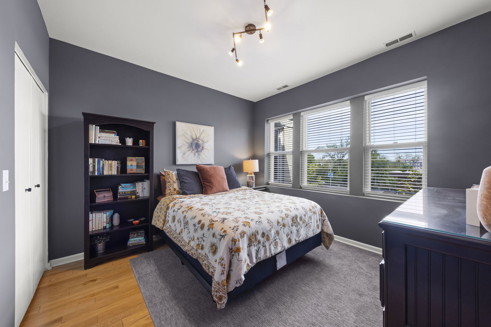 5054 North Troy Street, Unit 3 Chicago, IL 60625 - Photo 13 of 31 a bedroom with a large bed and a window