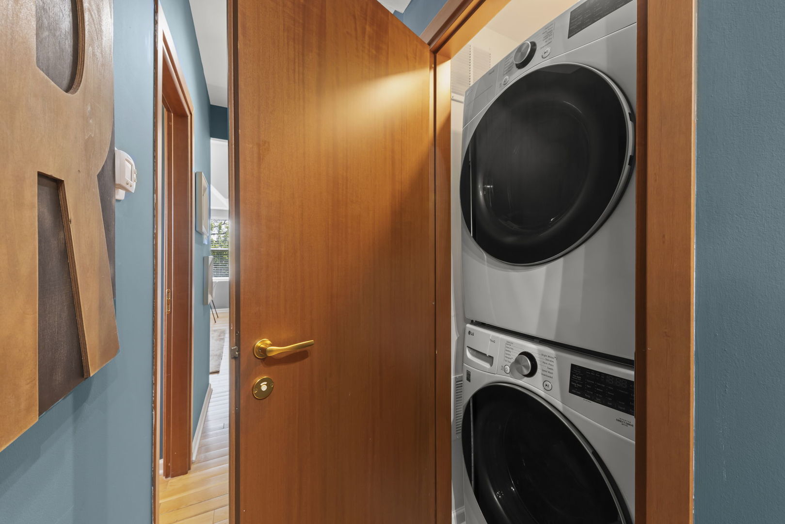 5054 North Troy Street, Unit 3 Chicago, IL 60625 - Photo 21 of 31 a close view of a utility room with dryer and washer