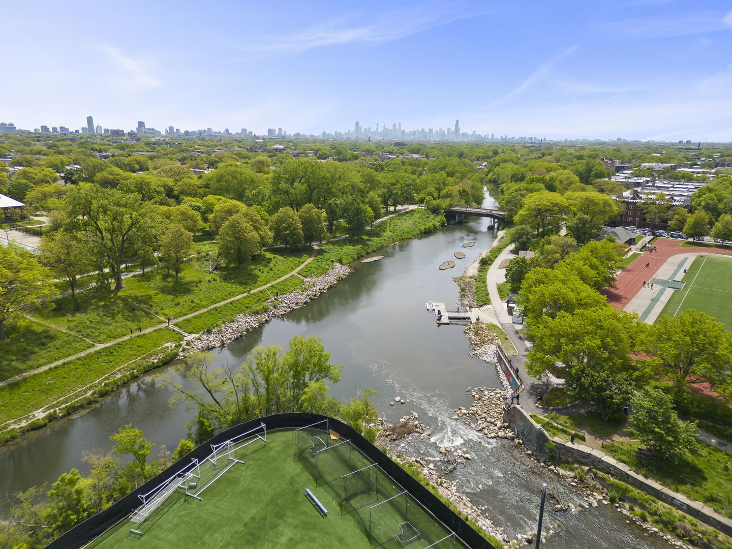 5054 North Troy Street, Unit 3 Chicago, IL 60625 - Photo 29 of 31 a view of a lake with a yard