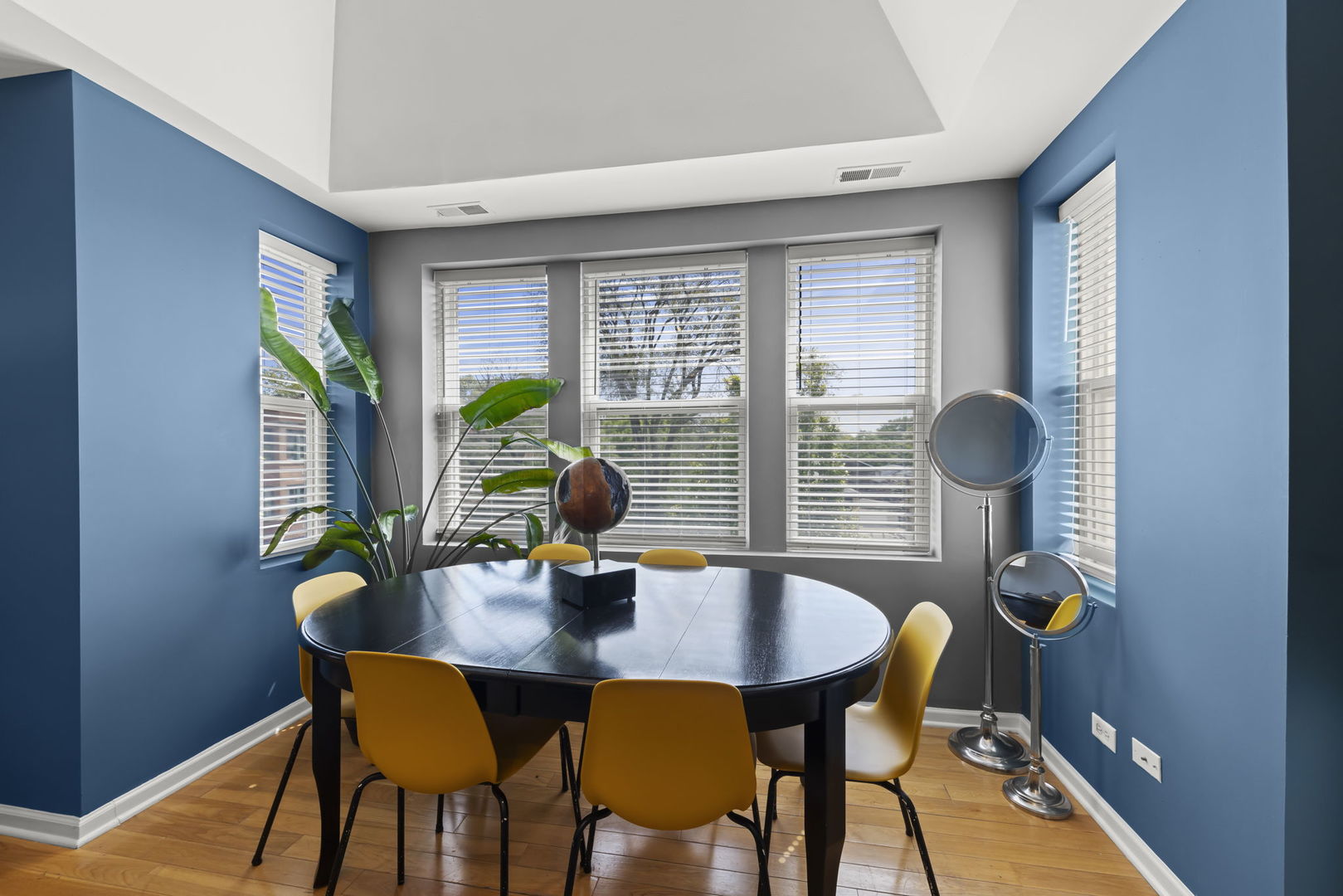 5054 North Troy Street, Unit 3 Chicago, IL 60625 - Photo 6 of 31 a view of a dining room with furniture and window