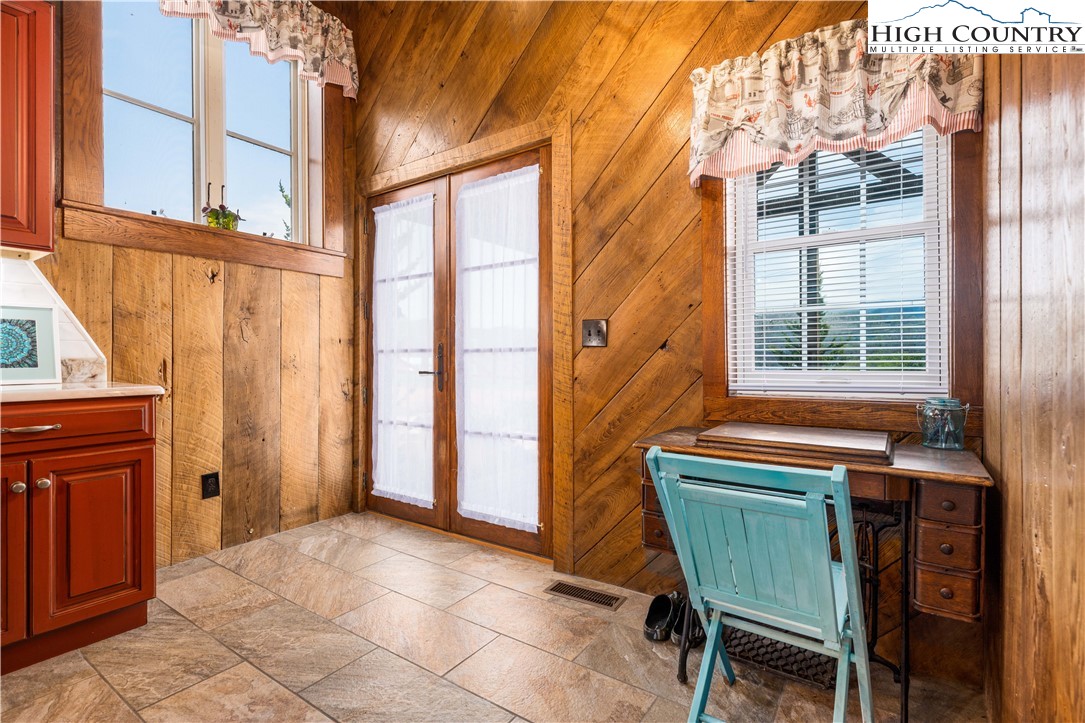 110 North River Lane Butler, TN 37640 - Photo 11 of 50 a backyard of a house with barbeque oven table and chairs