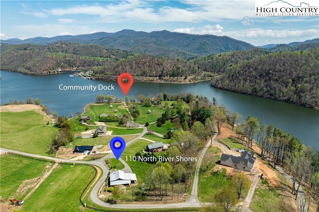 110 North River Lane Butler, TN 37640 - Photo 3 of 50 an aerial view of residential houses with outdoor space and lake view