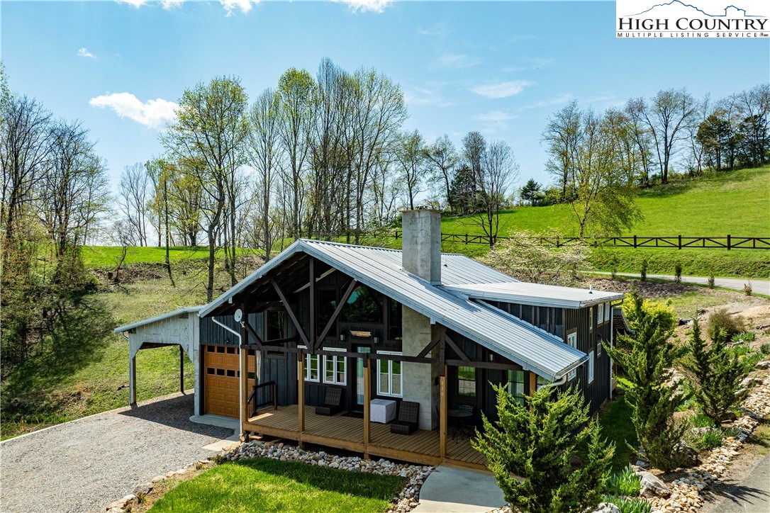 110 North River Lane Butler, TN 37640 - Photo 37 of 50 a view of a house with a yard