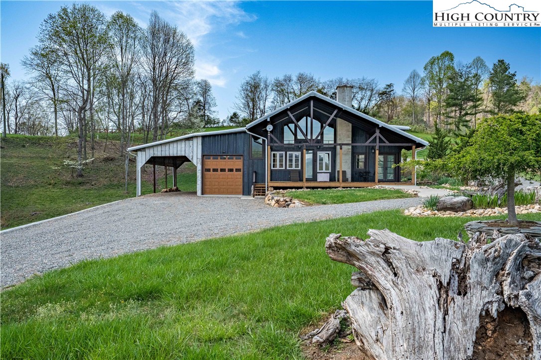 110 North River Lane Butler, TN 37640 - Photo 41 of 50 a front view of a house with yard and green space