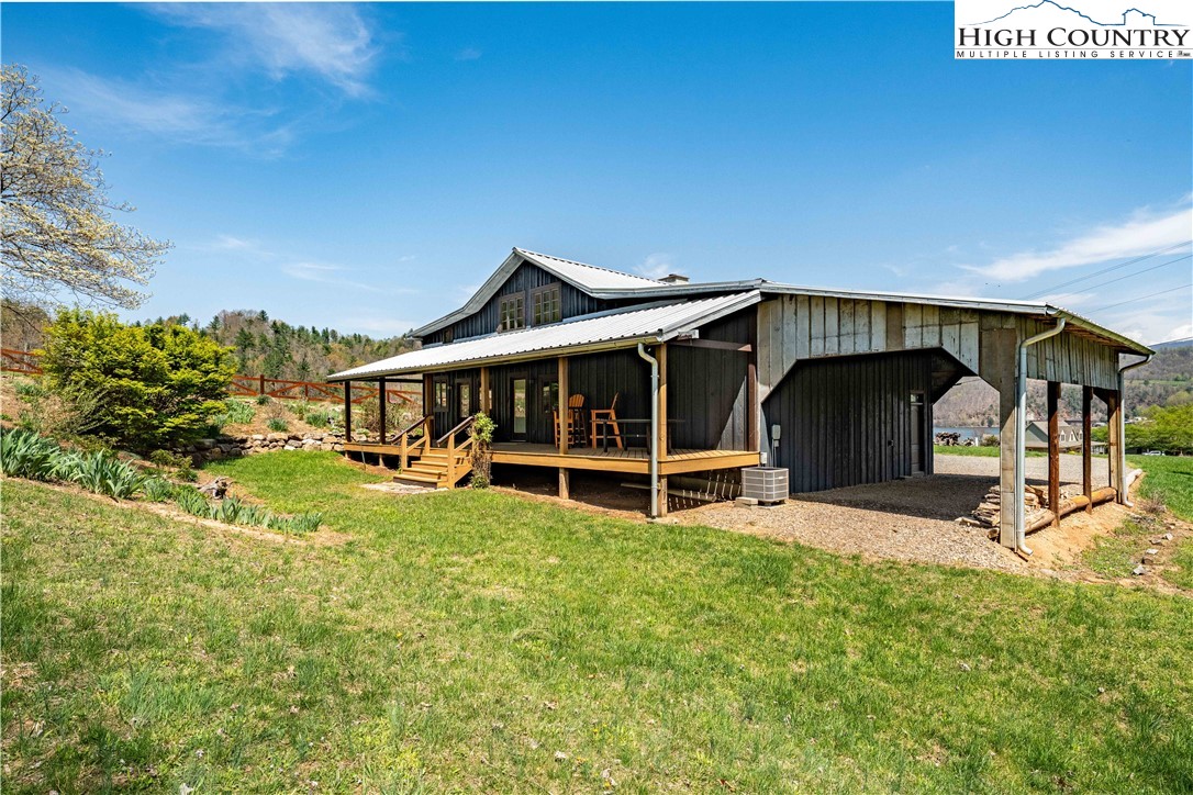 110 North River Lane Butler, TN 37640 - Photo 47 of 50 a view of a house with a yard and sitting area