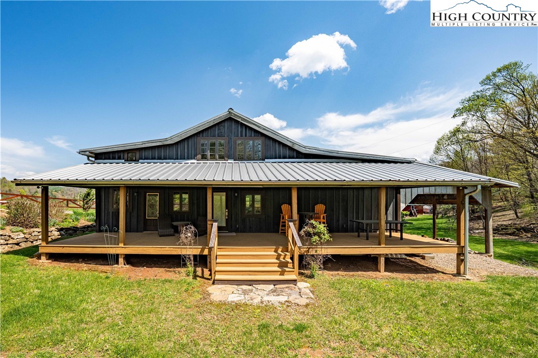 110 North River Lane Butler, TN 37640 - Photo 48 of 50 a view of a house with swimming pool and porch