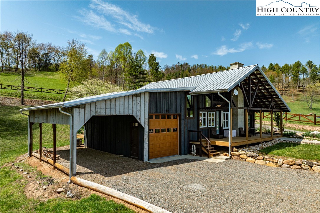 110 North River Lane Butler, TN 37640 - Photo 5 of 50 a view of a chair and table in backyard of the house