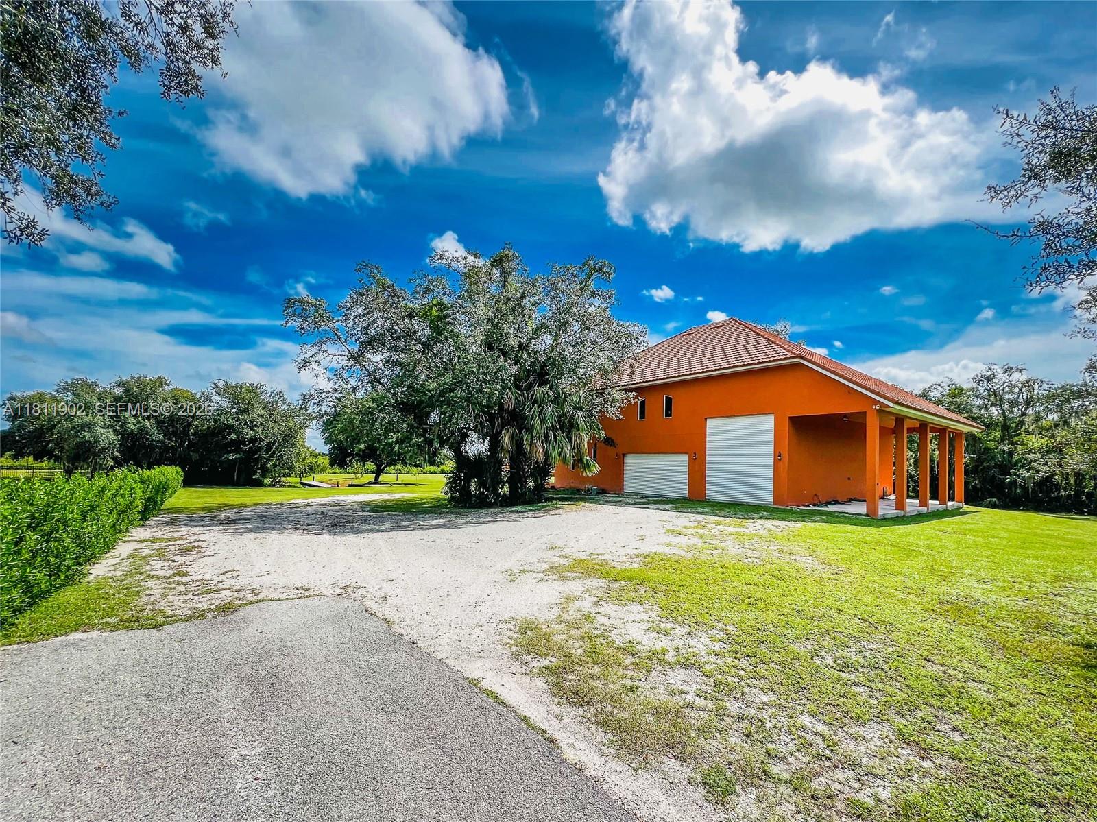 37511 Washington Loop Road Punta Gorda, FL 33982 - Photo 43 of 50 Garage side of Guest house