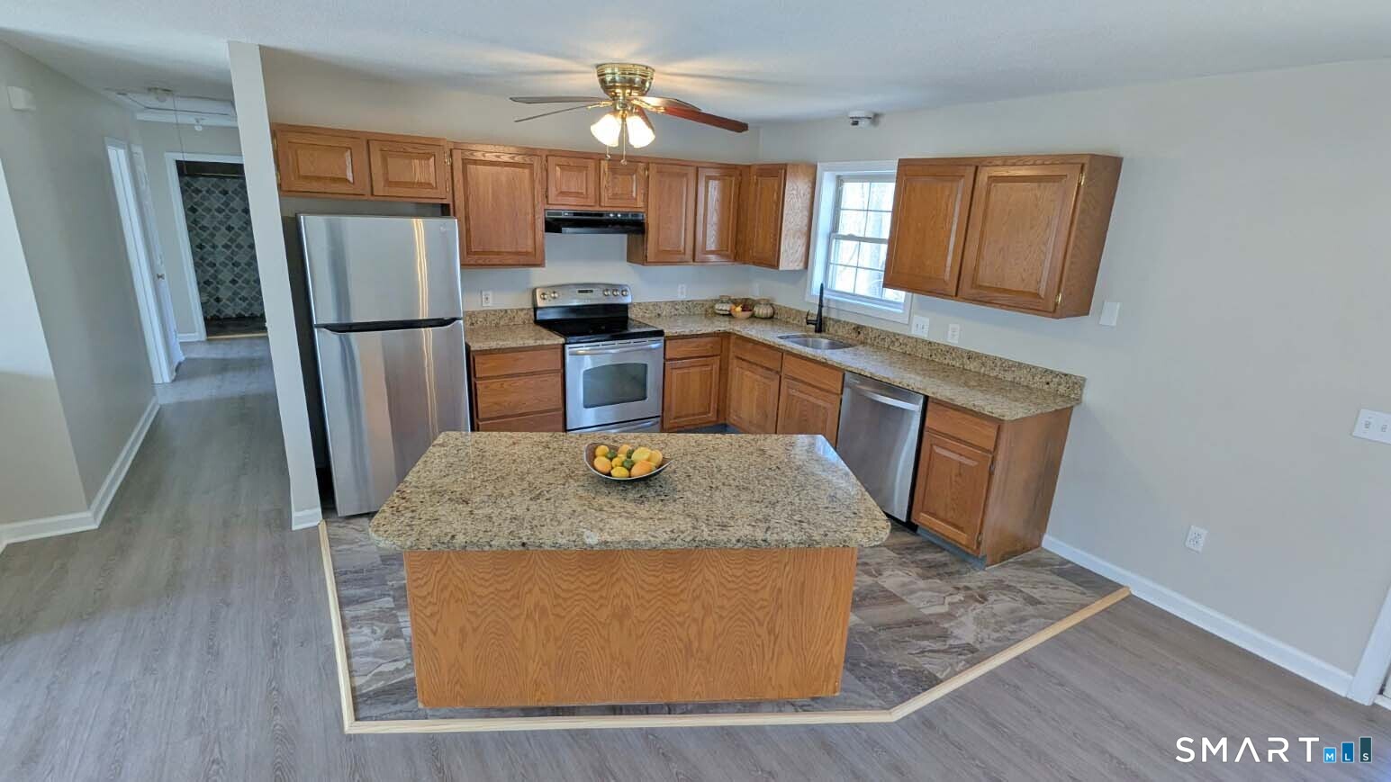 75 Brindlewood Path Colchester, CT 06415 - Photo 11 of 33 Kitchen with island breakfast bar