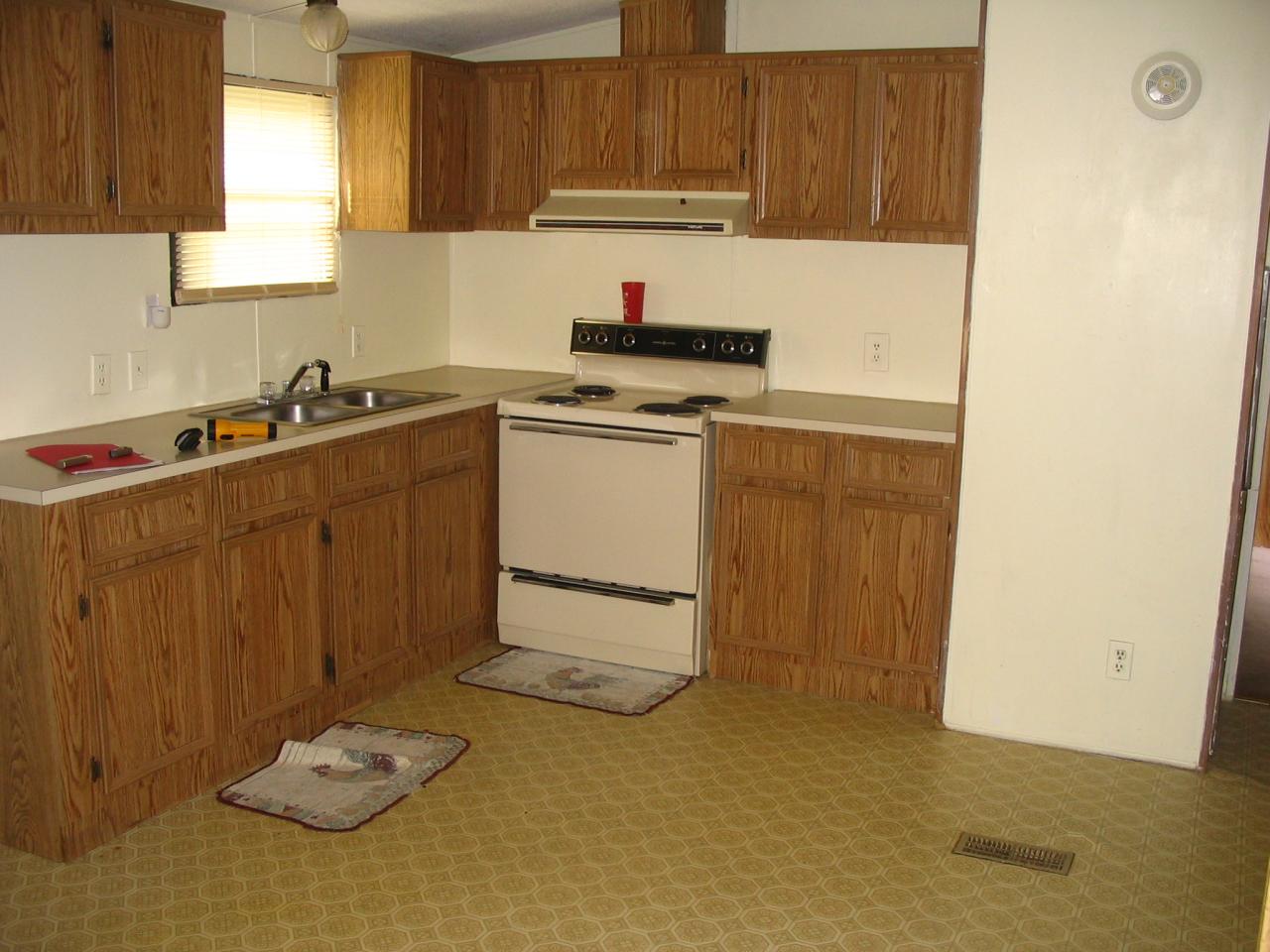 204 Bentwood Drive Blue Ridge, VA 24064 - Photo 2 of 7 a kitchen with a sink and cabinets