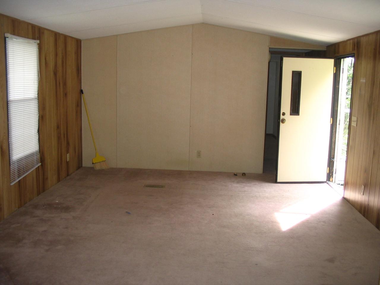 204 Bentwood Drive Blue Ridge, VA 24064 - Photo 3 of 7 an empty room with windows