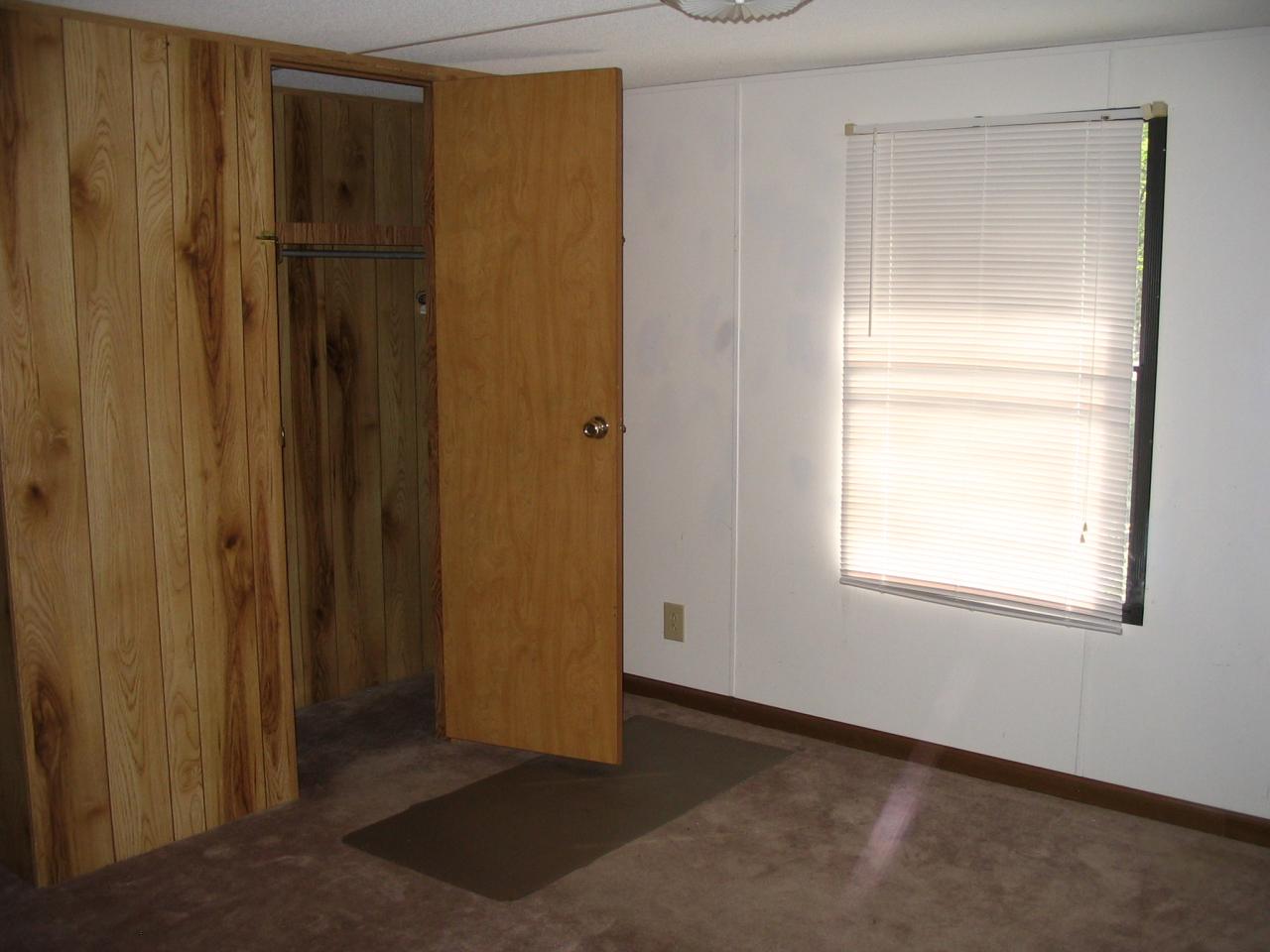 204 Bentwood Drive Blue Ridge, VA 24064 - Photo 7 of 7 a view of an empty room with closet and window