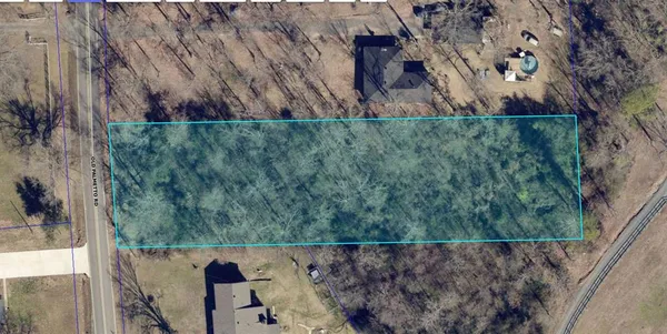 a view of roof and yard