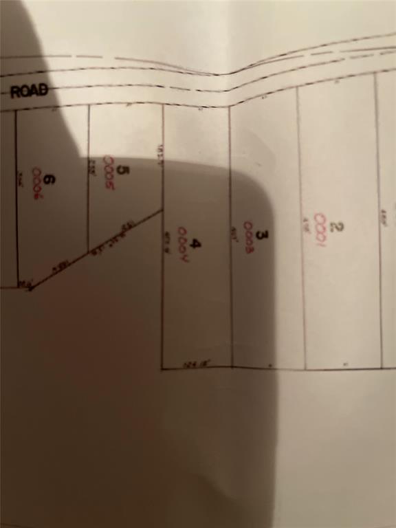 277 Old Palmetto Road Benton, LA 71006 - Photo 2 of 4 a bathroom with a glass shower door