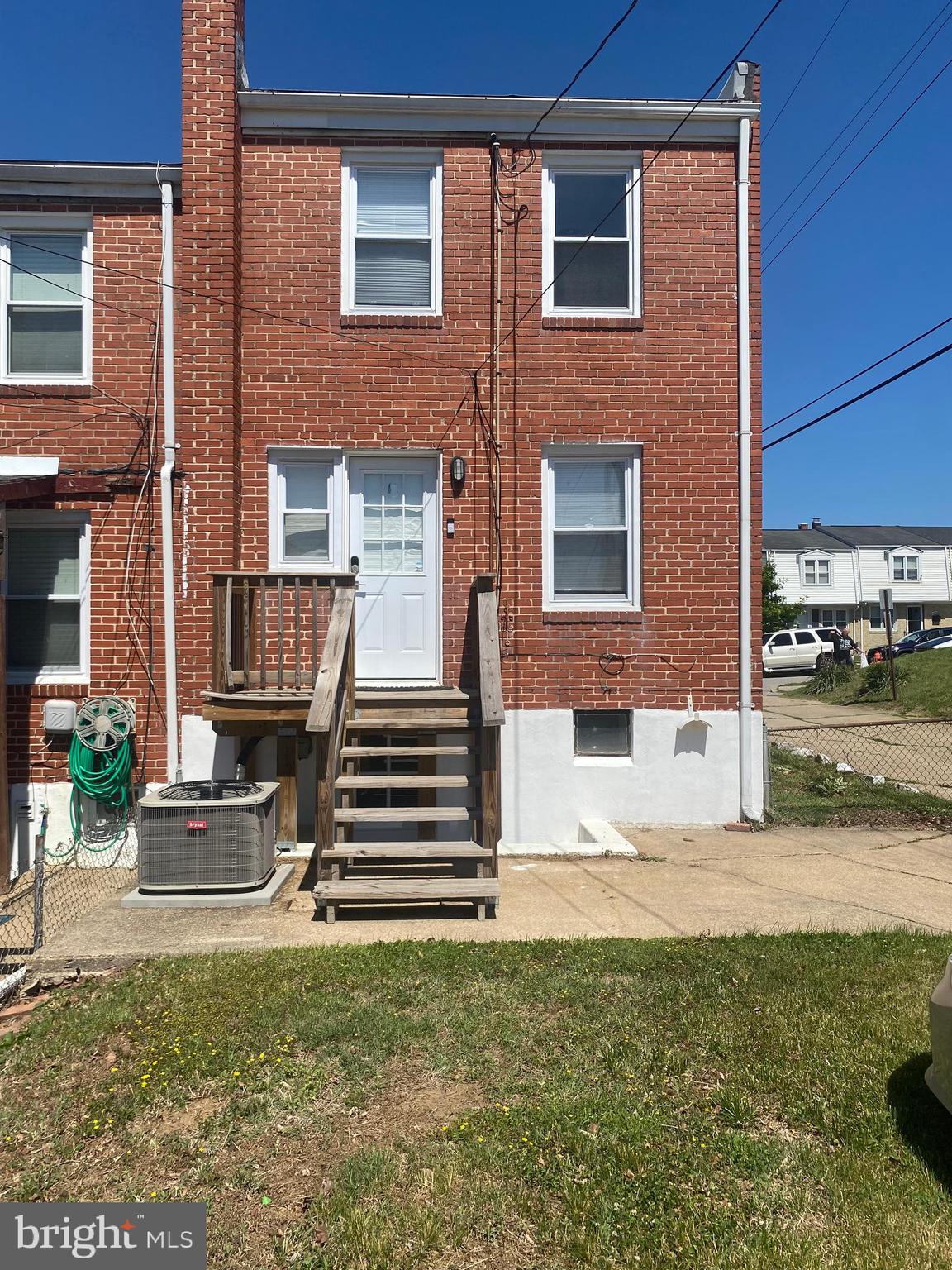 3643 Greenvale Road Baltimore, MD 21229 - Photo 3 of 23 a front view of a house with a yard