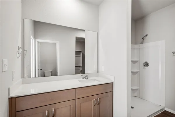 a view of an empty walk in closet