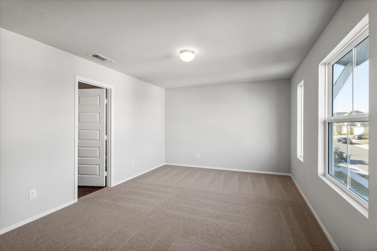 2711 Totley Road Manor, TX 78653 - Photo 28 of 40 an empty room with windows