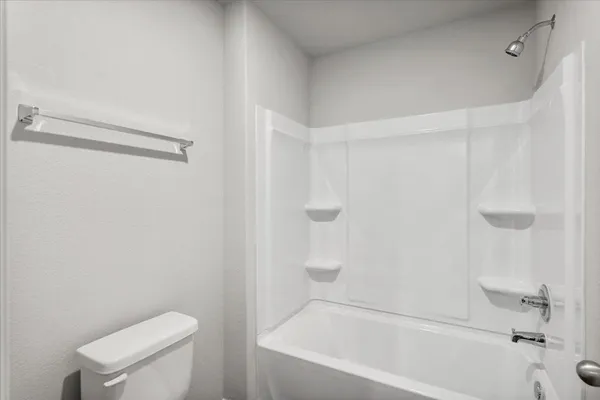 an empty room with a empty space and windows