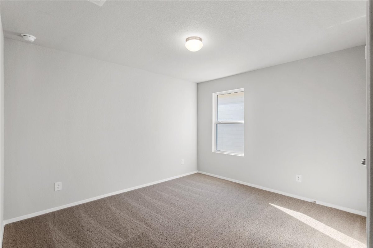 2711 Totley Road Manor, TX 78653 - Photo 31 of 40 a view of an empty room with a window