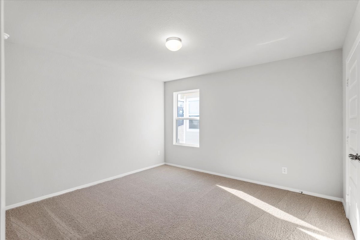 2711 Totley Road Manor, TX 78653 - Photo 37 of 40 a view of an empty room with a window