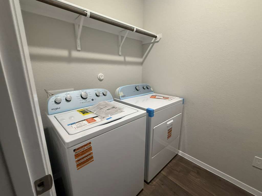 2711 Totley Road Manor, TX 78653 - Photo 39 of 40 a utility room with dryer and washer