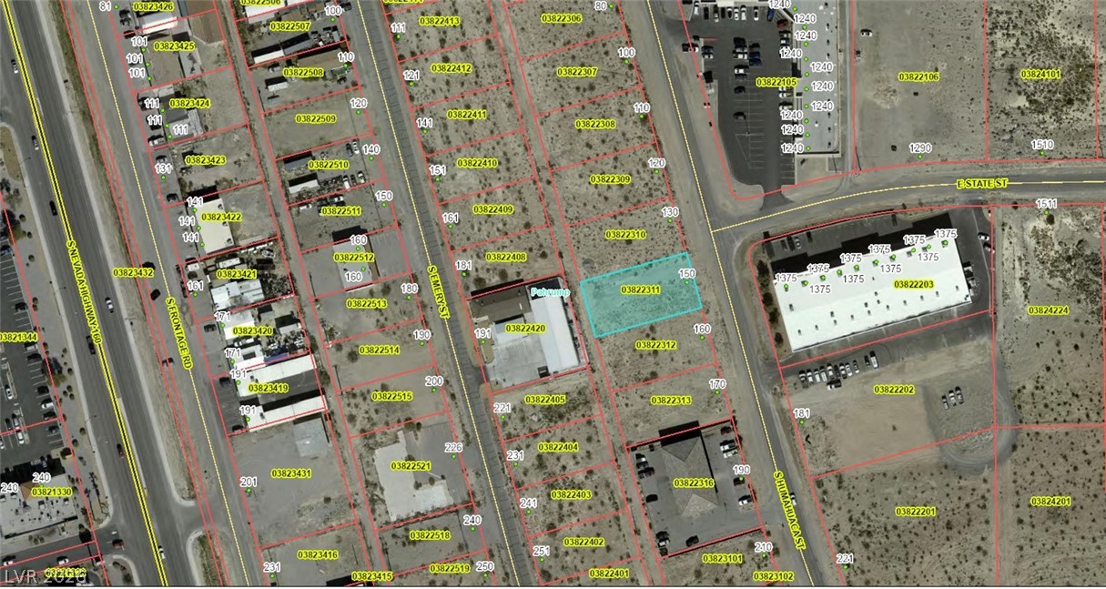 150 Humahuaca Street Pahrump, NV 89048 - Photo 4 of 5 An aerial perspective reveals a prime commercial lot amidst established businesses and convenient road access.