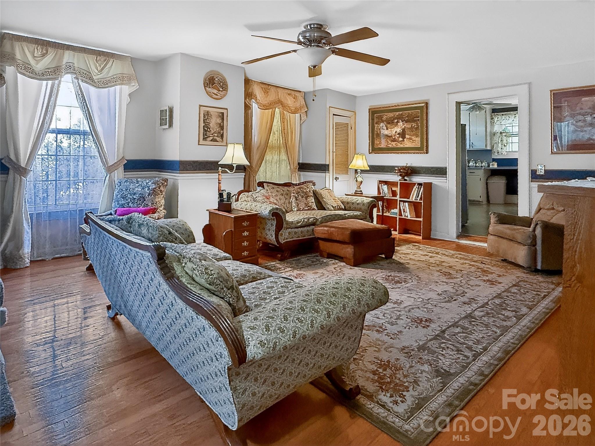 192 West Court Street Rutherfordton, NC 28139 - Photo 15 of 36 a living room with furniture and a flat screen tv