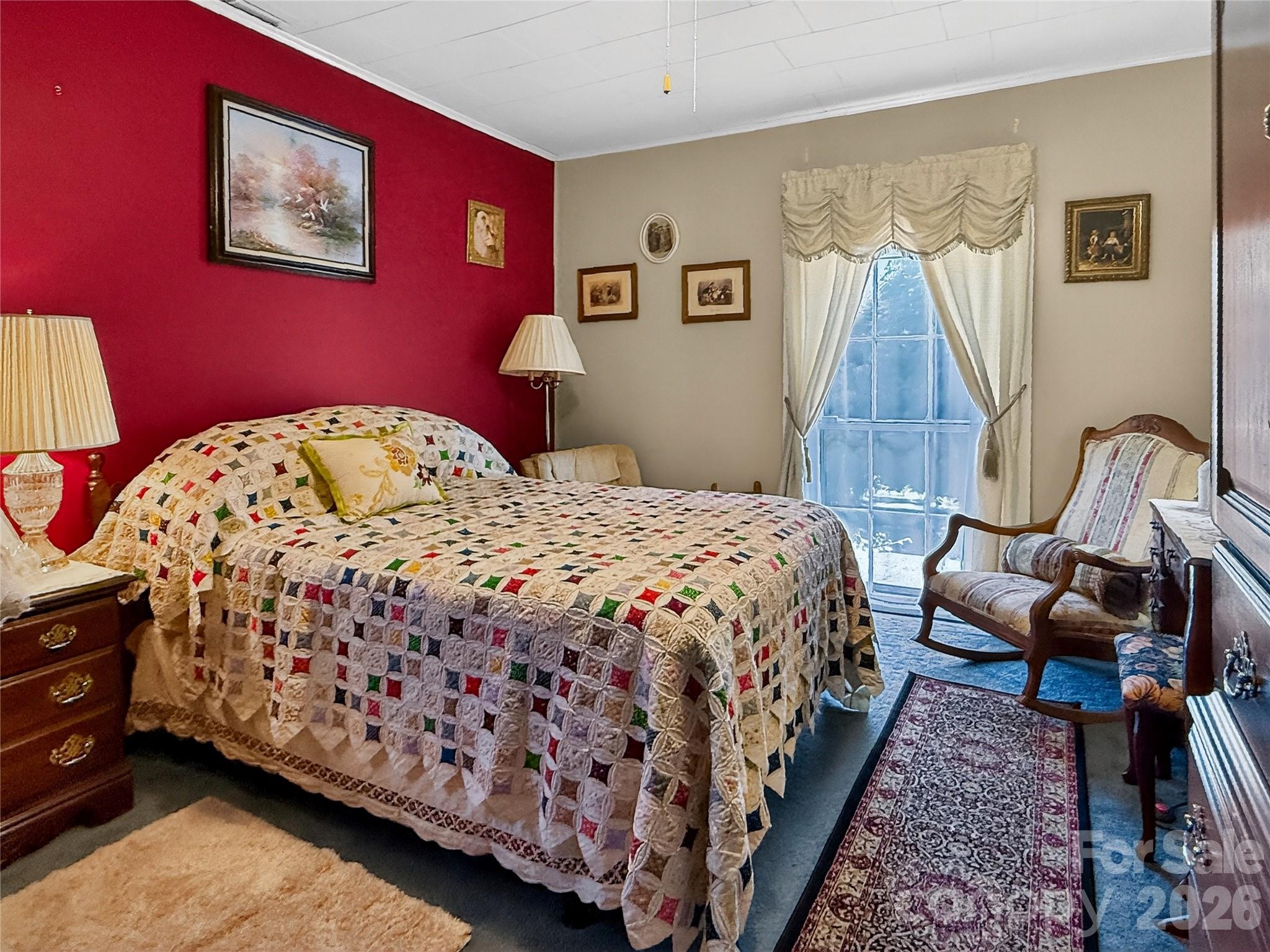 192 West Court Street Rutherfordton, NC 28139 - Photo 20 of 36 a bedroom with bed and a window