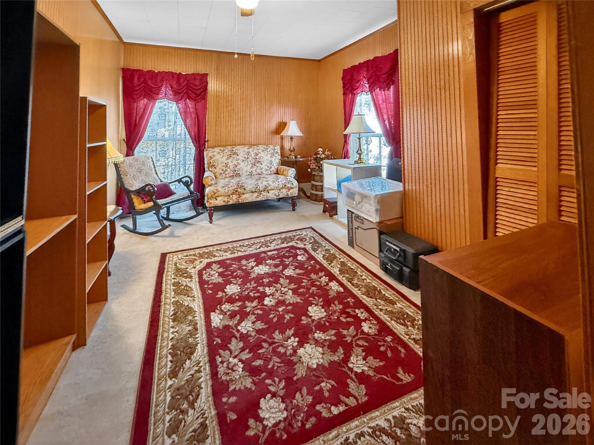 192 West Court Street Rutherfordton, NC 28139 - Photo 21 of 36 a living room with rug couches cushion and a window