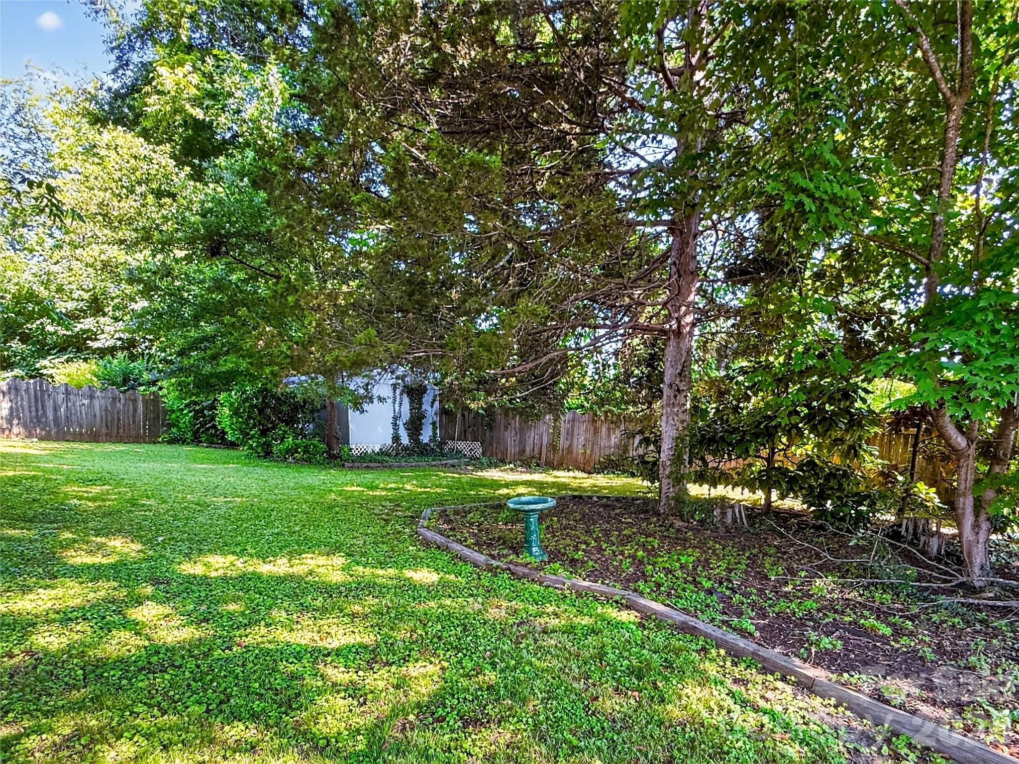 192 West Court Street Rutherfordton, NC 28139 - Photo 36 of 36 a backyard of a house with table and chairs