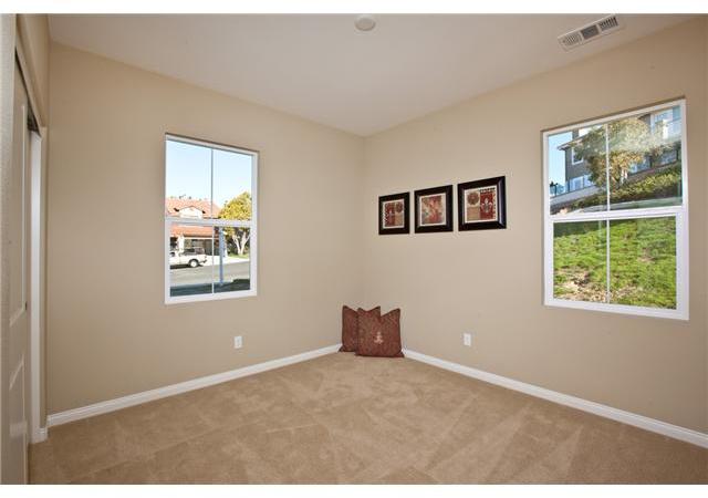 957 Alyssum Road Carlsbad, CA 92011 - Photo 14 of 20 Full bedroom downstairs.