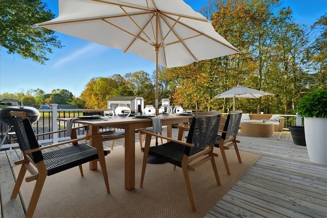 a view of a swimming pool with a patio