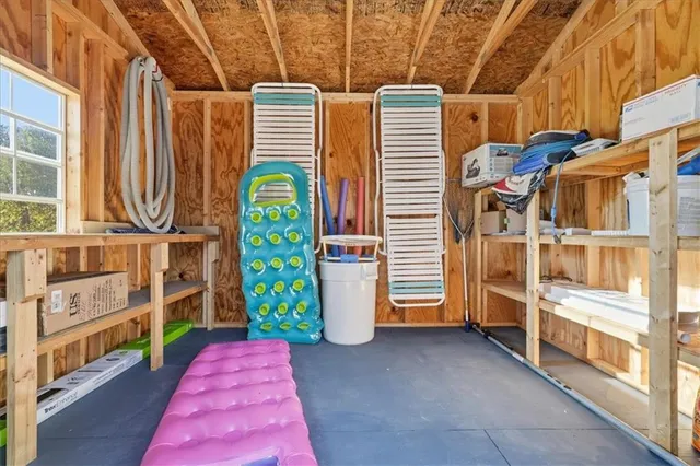 a view of living room filled with furniture